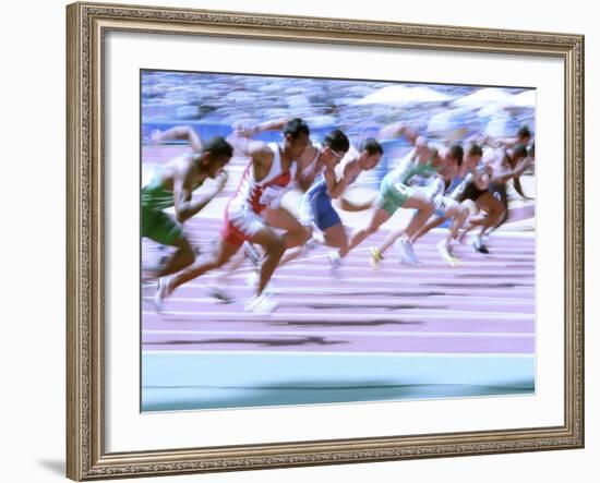 Blured Action at the Start of a Mens 100 Meter Track and Field Race-Paul Sutton-Framed Photographic Print