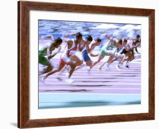 Blured Action at the Start of a Mens 100 Meter Track and Field Race-Paul Sutton-Framed Photographic Print