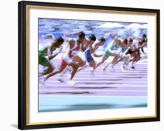 Blured Action at the Start of a Mens 100 Meter Track and Field Race-Paul Sutton-Framed Photographic Print