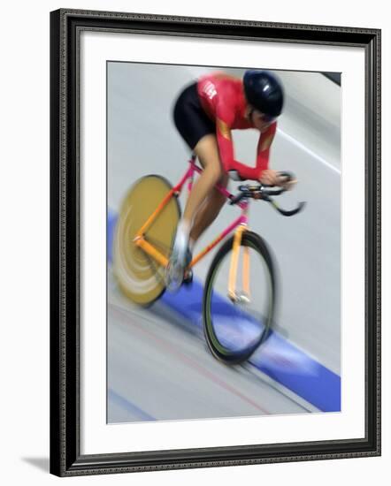 Blured Action of Female Cyclist Competing on the Velodrome-null-Framed Photographic Print