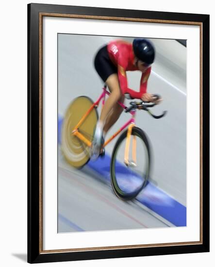 Blured Action of Female Cyclist Competing on the Velodrome-null-Framed Photographic Print