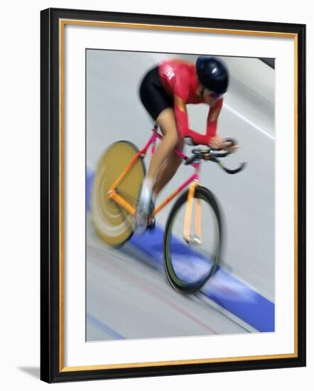 Blured Action of Female Cyclist Competing on the Velodrome-null-Framed Photographic Print