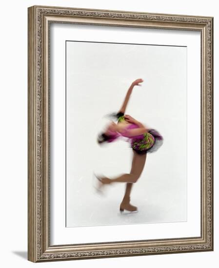 Blured Action of Female Figure Skater Preforming a Spin-Steven Sutton-Framed Photographic Print