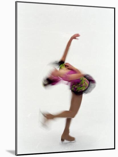 Blured Action of Female Figure Skater Preforming a Spin-Steven Sutton-Mounted Photographic Print