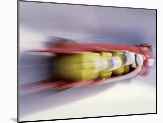 Blurred Action of 4 Man Bobsled Team, Lillehammer, Norway-null-Mounted Photographic Print