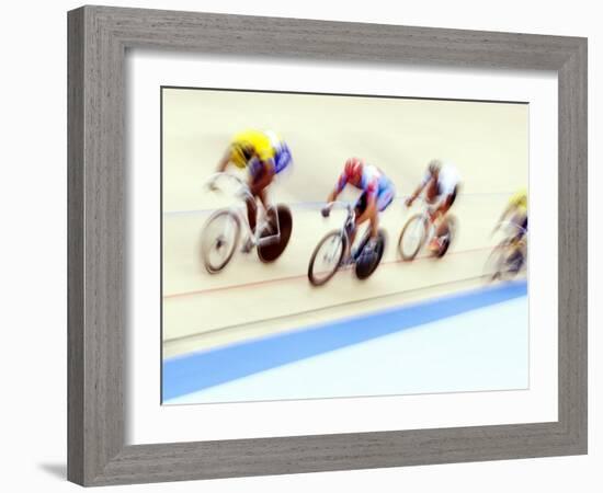 Blurred Action of Cyclist on the Track-Chris Trotman-Framed Photographic Print