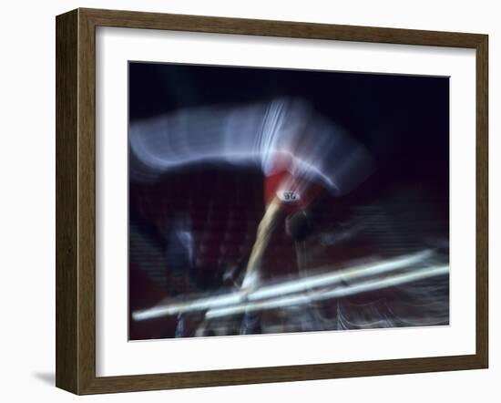 Blurred Action of Male Gymnast on the Parallel Bars-null-Framed Photographic Print