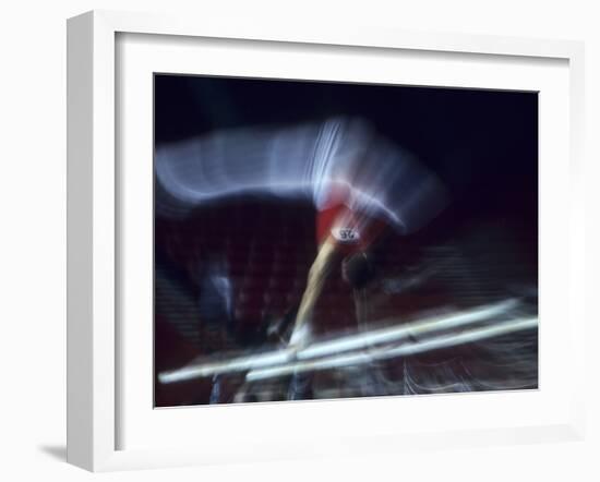 Blurred Action of Male Gymnast on the Parallel Bars-null-Framed Photographic Print