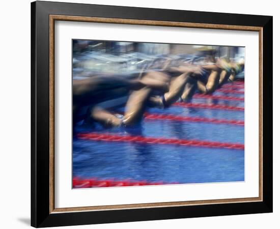 Blurred Action of Male Swimmers at the Start of a Race-null-Framed Photographic Print