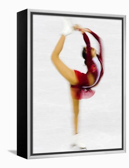 Blurred Action of Woman Figure Skater, Torino, Italy-Chris Trotman-Framed Premier Image Canvas