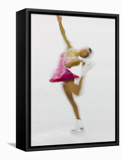 Blurred Action of Woman Figure Skater, Torino, Italy-Chris Trotman-Framed Premier Image Canvas