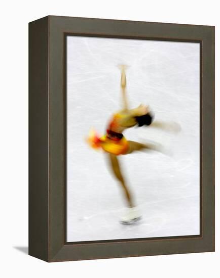 Blurred Action of Woman Figure Skater, Torino, Italy-Chris Trotman-Framed Premier Image Canvas