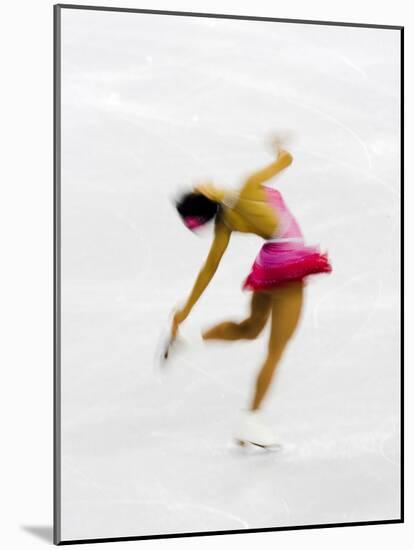 Blurred Action of Woman Figure Skater, Torino, Italy-Chris Trotman-Mounted Photographic Print