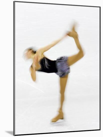 Blurred Action of Woman Figure Skater, Torino, Italy-Chris Trotman-Mounted Photographic Print