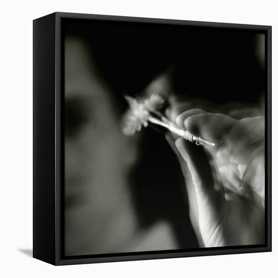Blurred Image of a Man Aiming a Dart-null-Framed Premier Image Canvas