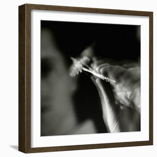 Blurred Image of a Man Aiming a Dart-null-Framed Photographic Print