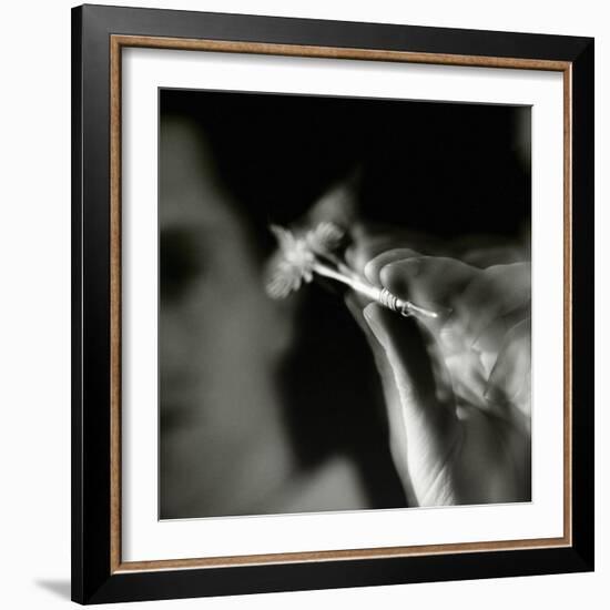 Blurred Image of a Man Aiming a Dart-null-Framed Photographic Print