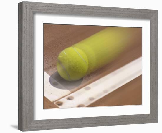 Blurred Image of a Tennis Ball Landing In Bounds-null-Framed Photographic Print