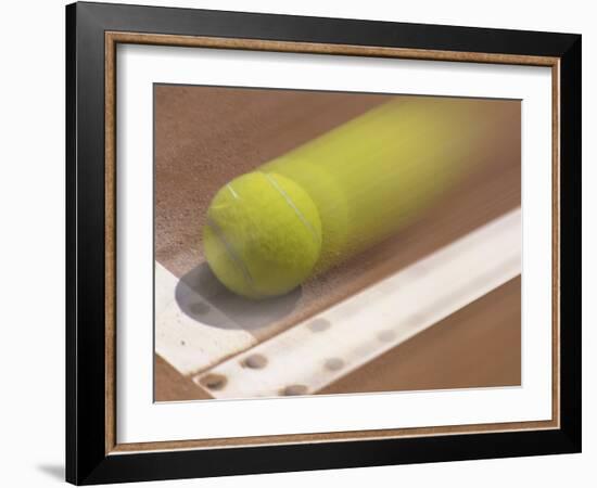 Blurred Image of a Tennis Ball Landing In Bounds-null-Framed Photographic Print