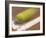 Blurred Image of a Tennis Ball Landing In Bounds-null-Framed Photographic Print