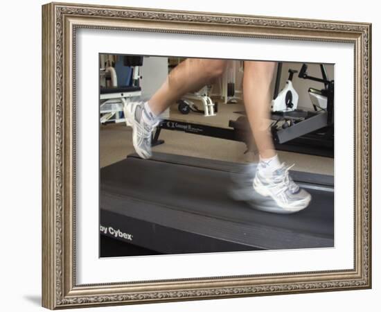 Blurred Image of Legs on a Treadmill-null-Framed Photographic Print