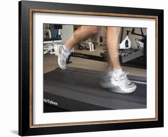 Blurred Image of Legs on a Treadmill-null-Framed Photographic Print