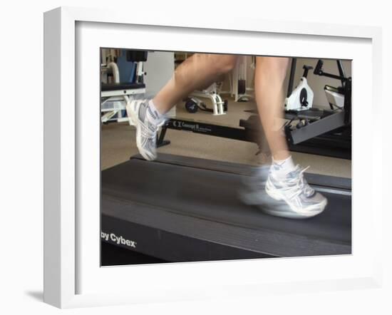 Blurred Image of Legs on a Treadmill-null-Framed Photographic Print