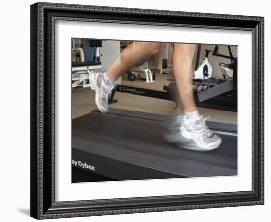 Blurred Image of Legs on a Treadmill-null-Framed Photographic Print