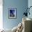 Blurred View of Cyclist-null-Framed Photographic Print displayed on a wall