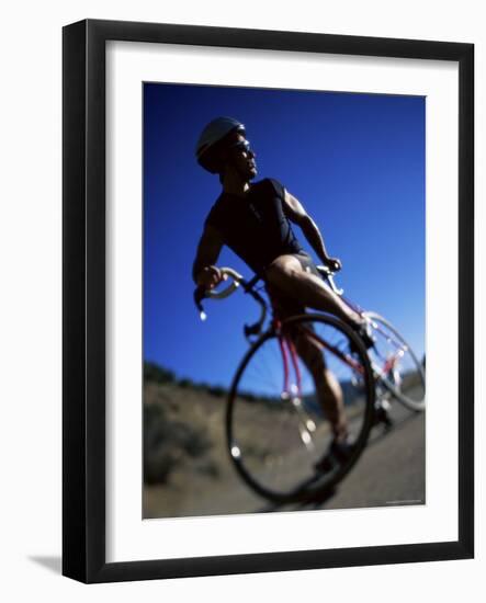 Blurred View of Cyclist-null-Framed Photographic Print