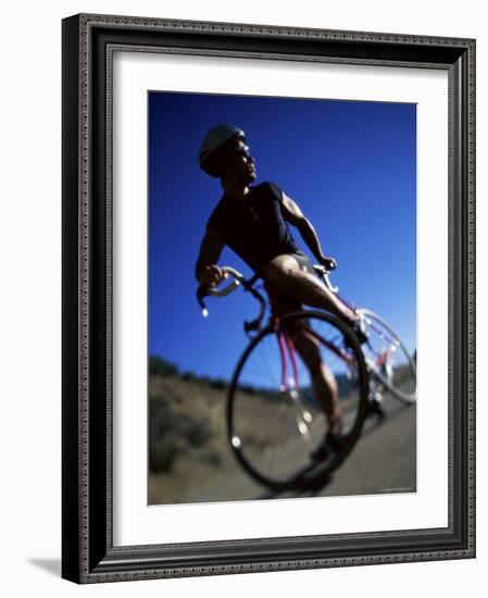 Blurred View of Cyclist-null-Framed Photographic Print