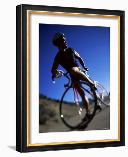 Blurred View of Cyclist-null-Framed Photographic Print