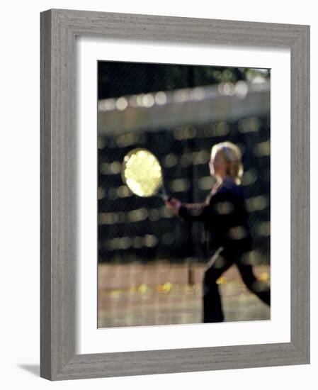 Blurry Image of a Girl Playing Tennis-null-Framed Photographic Print