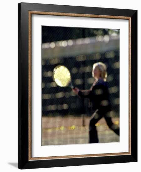 Blurry Image of a Girl Playing Tennis-null-Framed Photographic Print