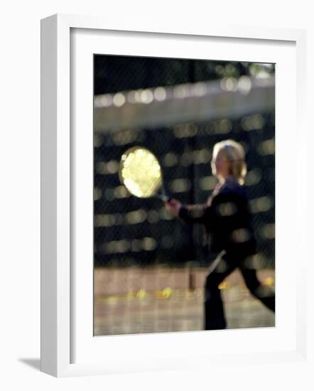 Blurry Image of a Girl Playing Tennis-null-Framed Photographic Print