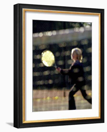 Blurry Image of a Girl Playing Tennis-null-Framed Photographic Print