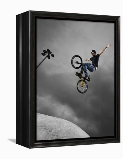 BMX Biker Performing Tricks-null-Framed Premier Image Canvas