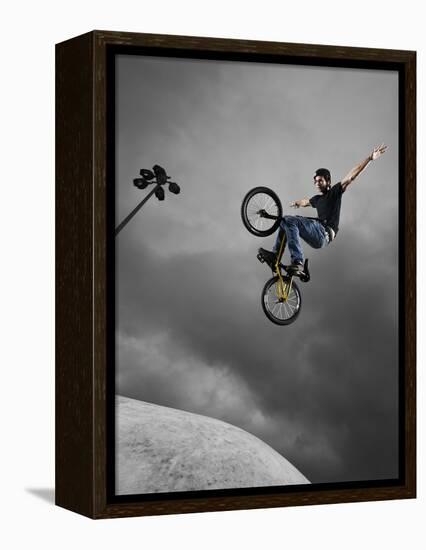 BMX Biker Performing Tricks-null-Framed Premier Image Canvas