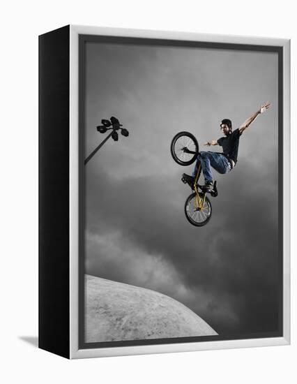 BMX Biker Performing Tricks-null-Framed Premier Image Canvas