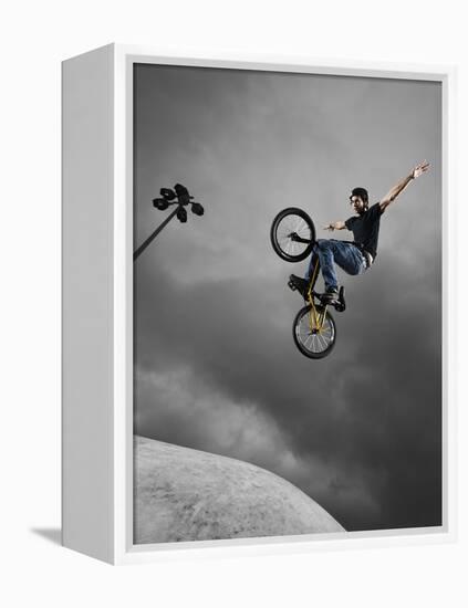 BMX Biker Performing Tricks-null-Framed Premier Image Canvas