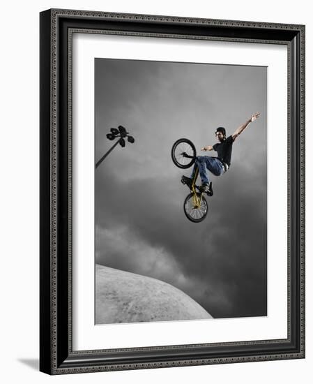 BMX Biker Performing Tricks-null-Framed Photographic Print