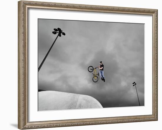 BMX Biker Performing Tricks-null-Framed Photographic Print