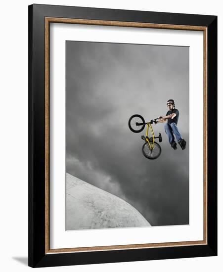 BMX Biker Performing Tricks-null-Framed Photographic Print
