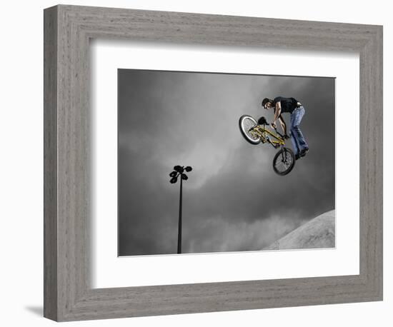 BMX Biker Performing Tricks-null-Framed Photographic Print