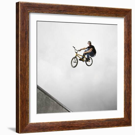 BMX Biker Performing Tricks-null-Framed Photographic Print