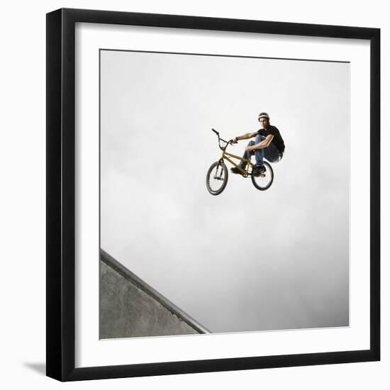 BMX Biker Performing Tricks-null-Framed Photographic Print