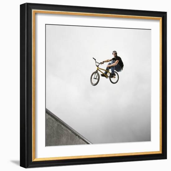 BMX Biker Performing Tricks-null-Framed Photographic Print