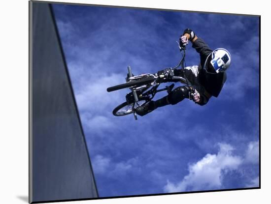 Bmx Cyclist Flying Off the Vert-null-Mounted Photographic Print