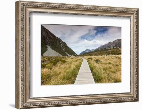 Boardwalk on landscape, Hooker Valley Track, Aoraki/Mount Cook National Park, Canterbury, South...-null-Framed Photographic Print