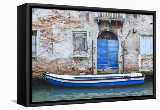 Boat And Blue Door. Venice. Venezia Province. Veneto. Italy-Oscar Dominguez-Framed Premier Image Canvas